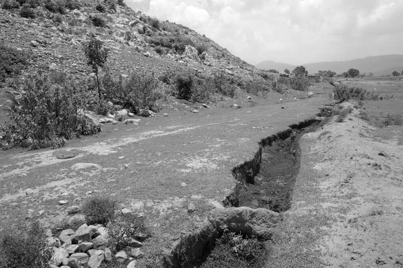 A 'water absorption trench' in Koilu watershed constructed at the base of the hill to help water and soil conservation, under Jaya Devi - the Water Lady's leadership